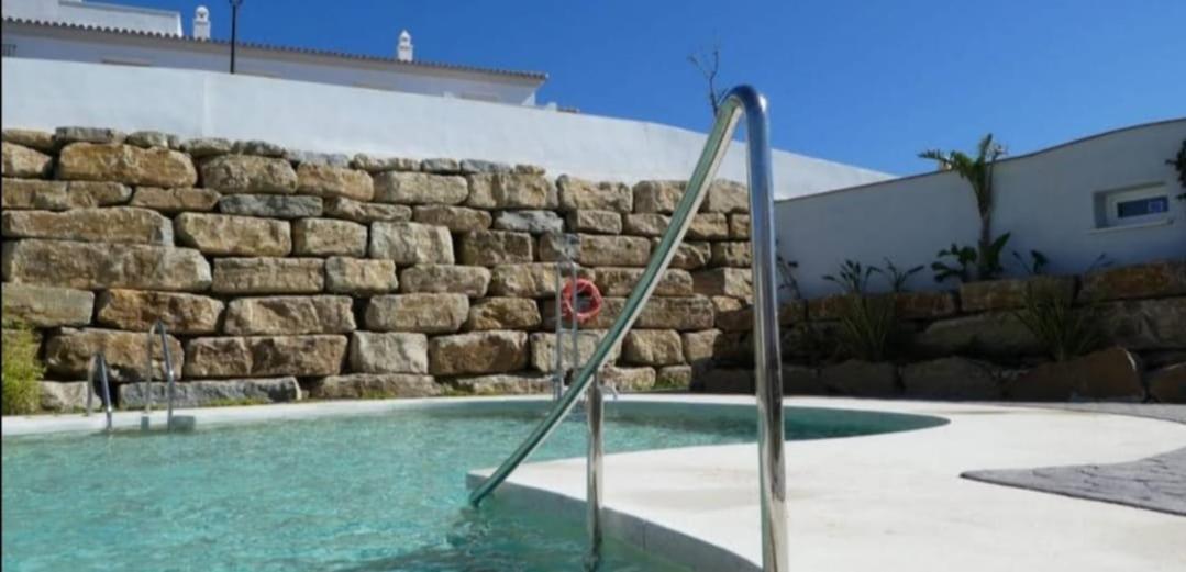Agradable Casa Adosada Con Piscina Zahara de los Atunes Kültér fotó