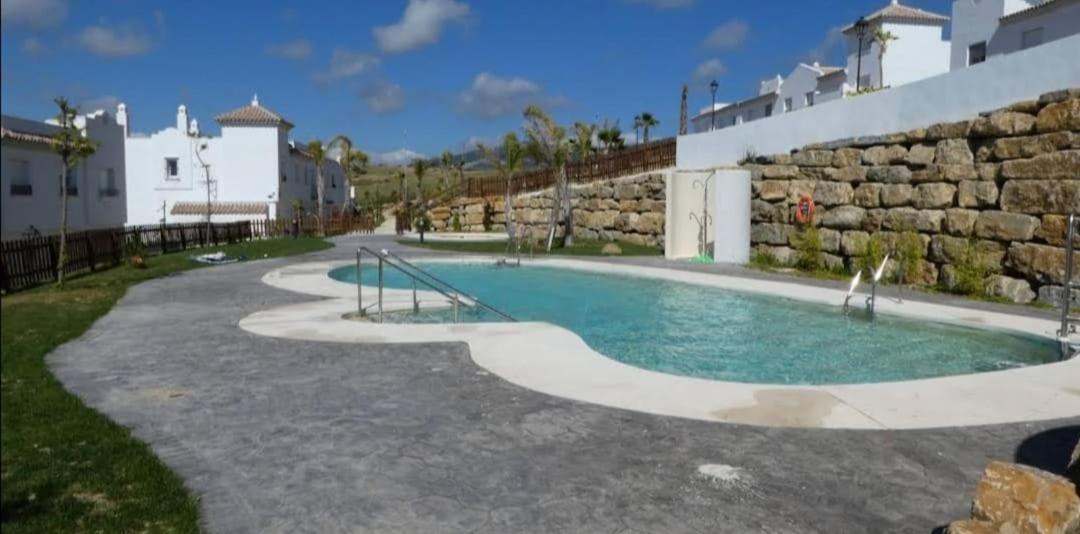 Agradable Casa Adosada Con Piscina Zahara de los Atunes Kültér fotó