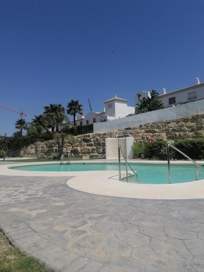 Agradable Casa Adosada Con Piscina Zahara de los Atunes Kültér fotó